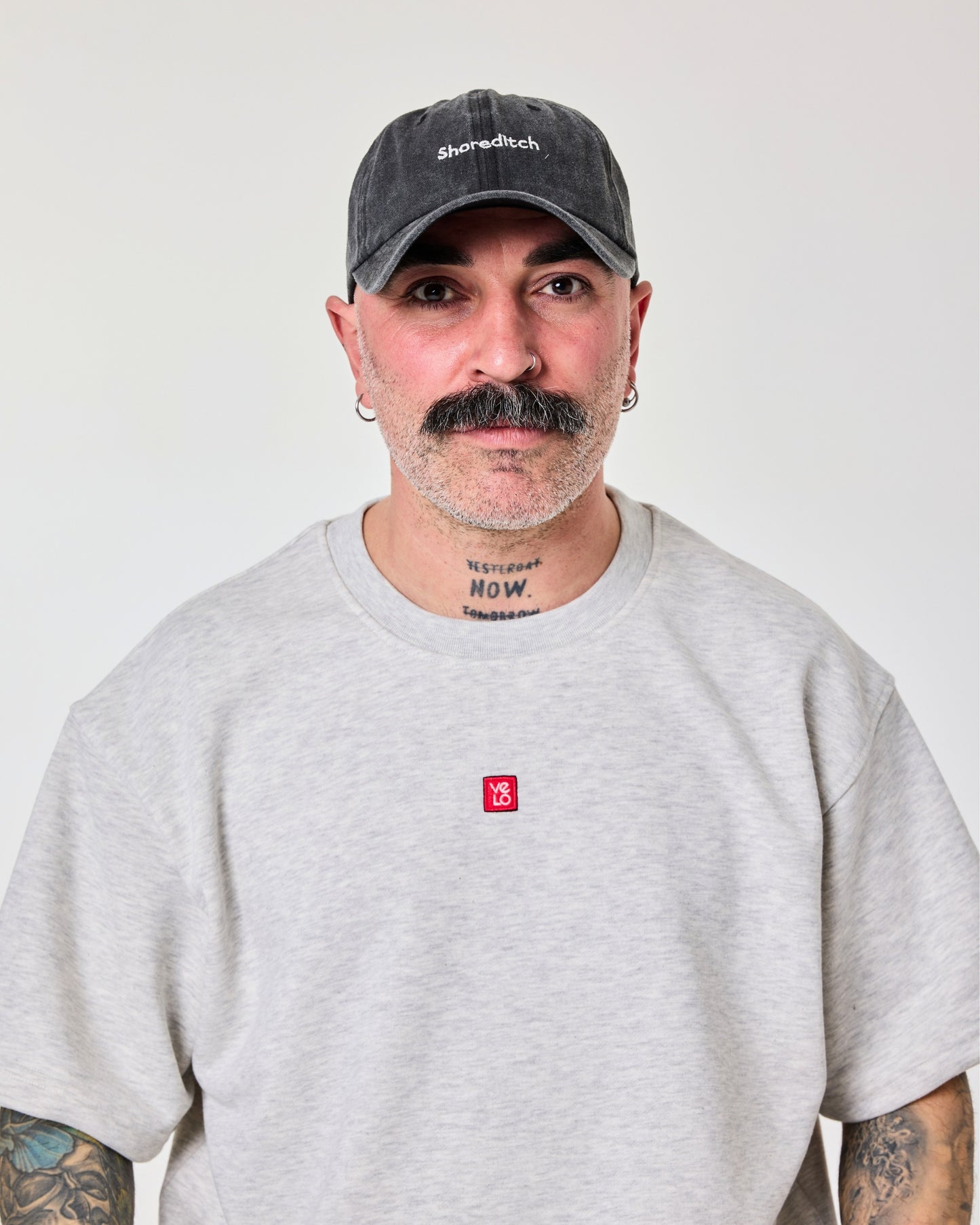 front view of a man wearing Shoreditch Dark Green Washed Cap