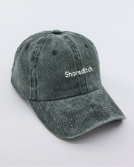 side view of Shoreditch Dark Green Washed Cap