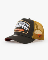 Side view of All Rights Reserved Khaki Trucker Hat