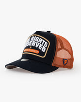 Side view of All Rights Reserved Navy Blue Trucker Hat