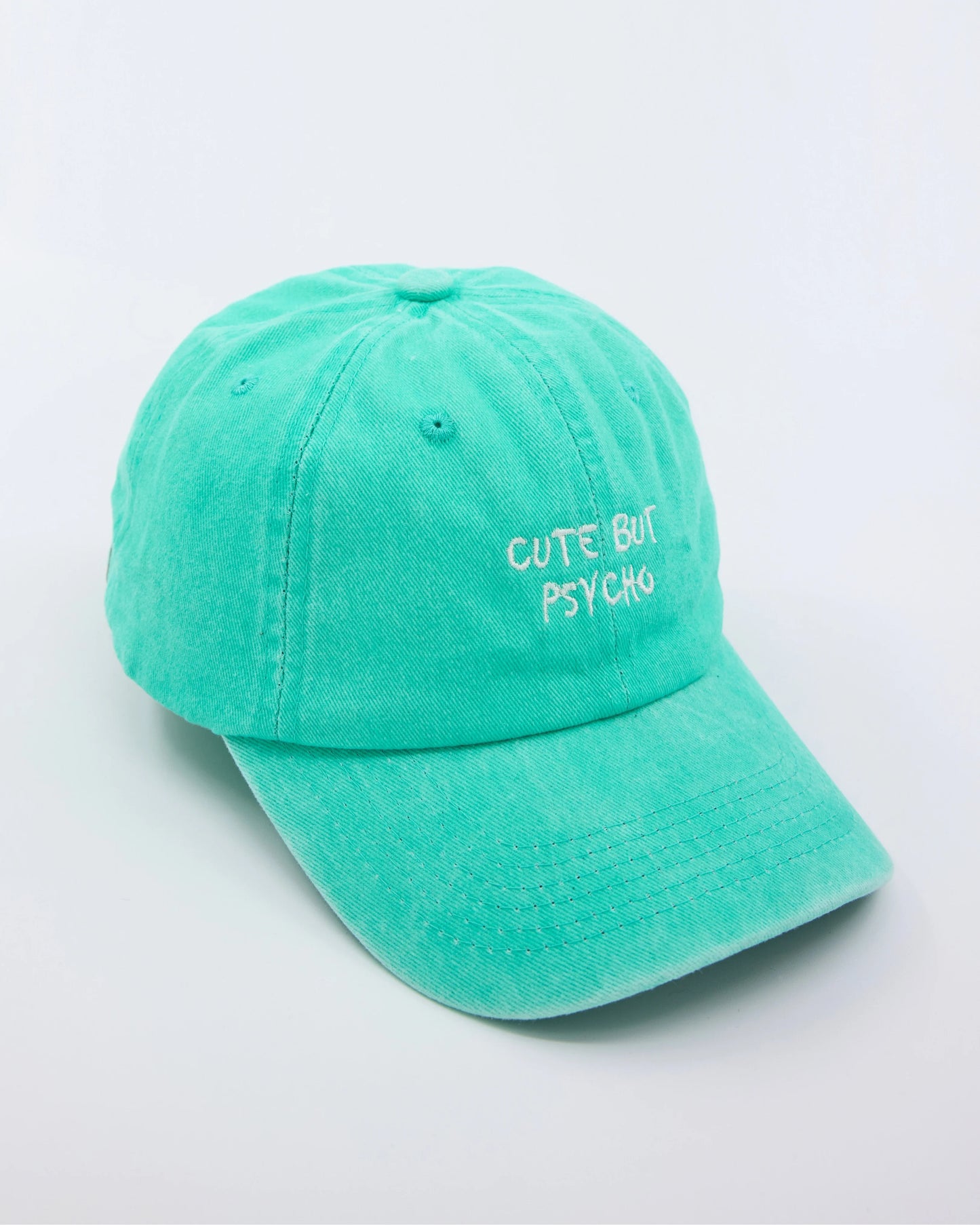 side view of Cute But Psycho Aqua Blue Washed Caps