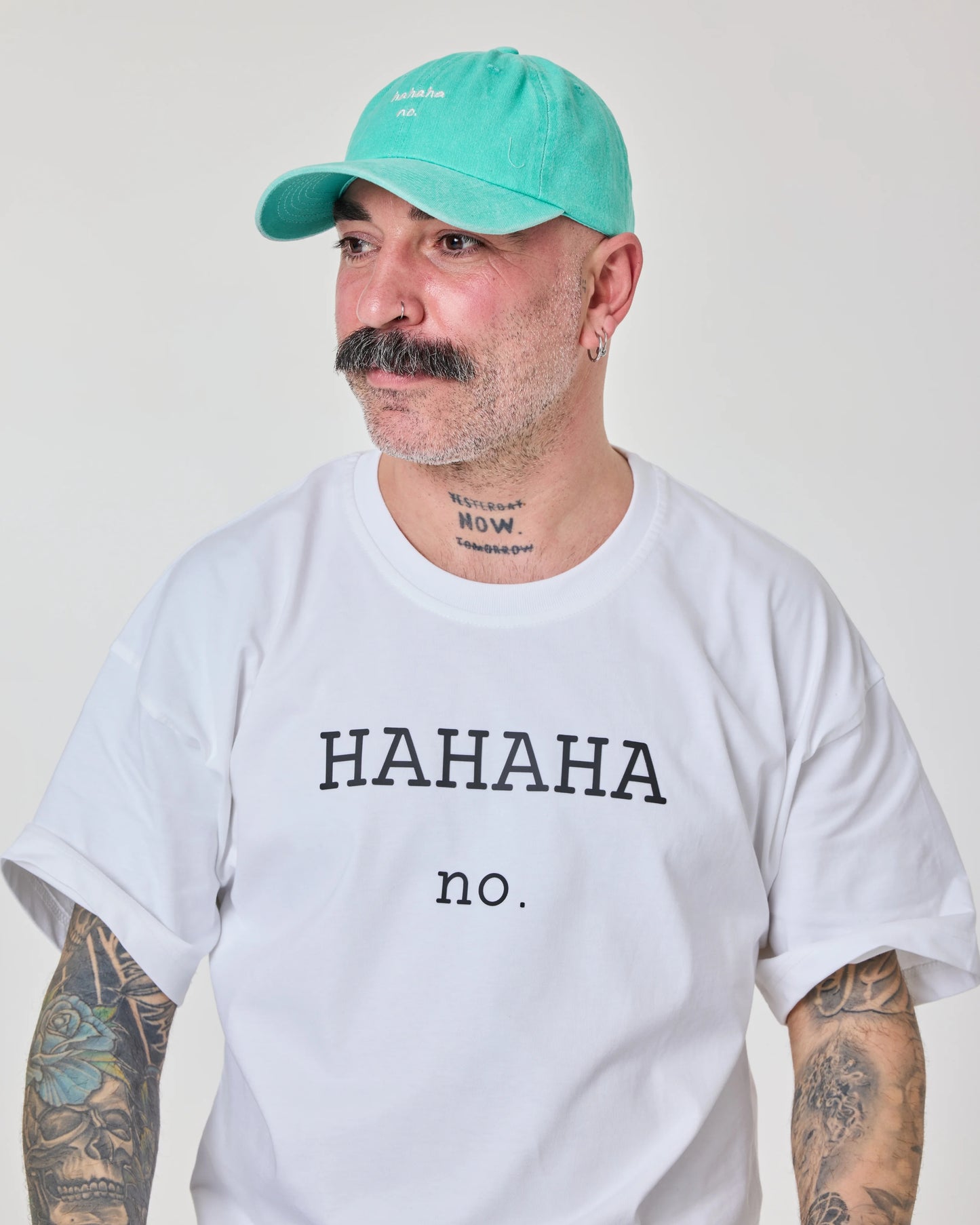 man wearing Hahaha No Aqua Blue Washed Cap Hat