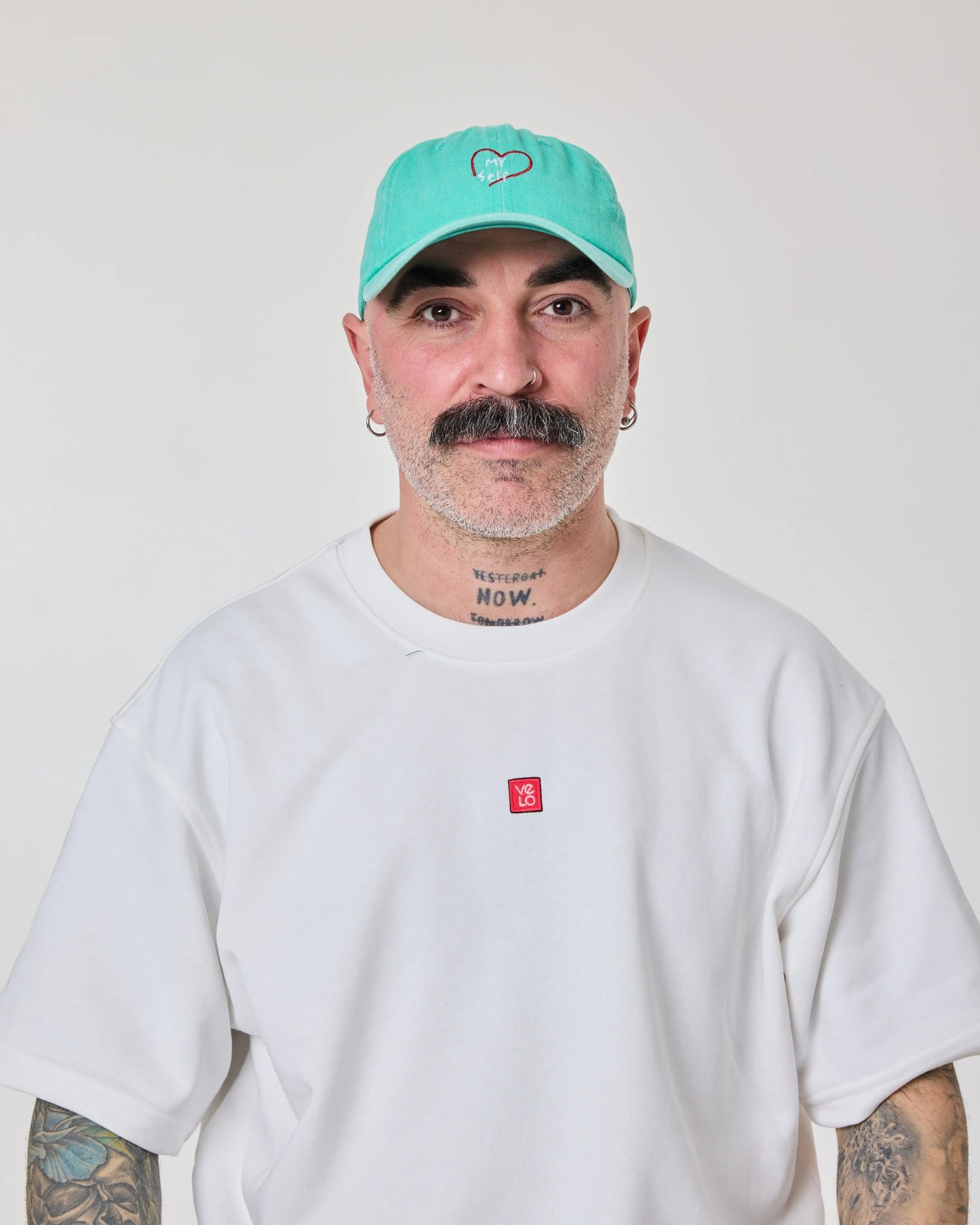 man wearing Love Myself Aqua Blue Washed Cap