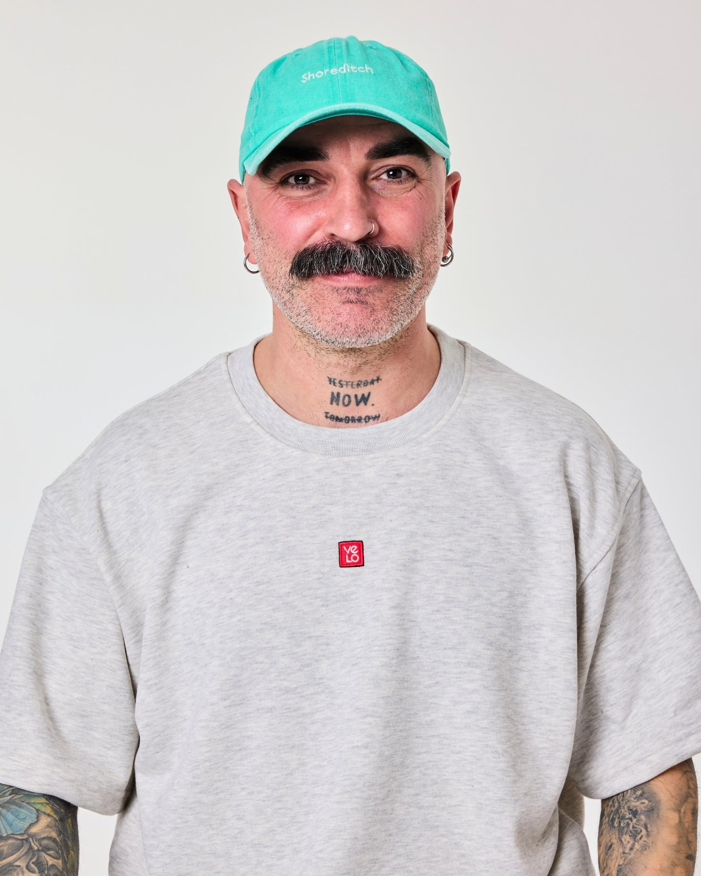 man wearing Shoreditch Aqua Blue Washed Cap