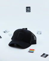 Side view of Black and Black Meshed Customisable Trucker Cap