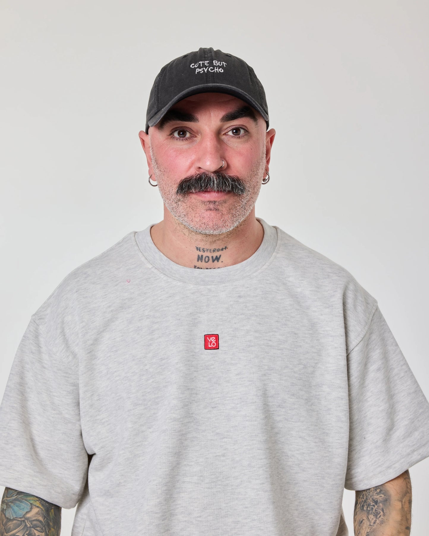 man wearing Cute But Psycho Black Washed Cap