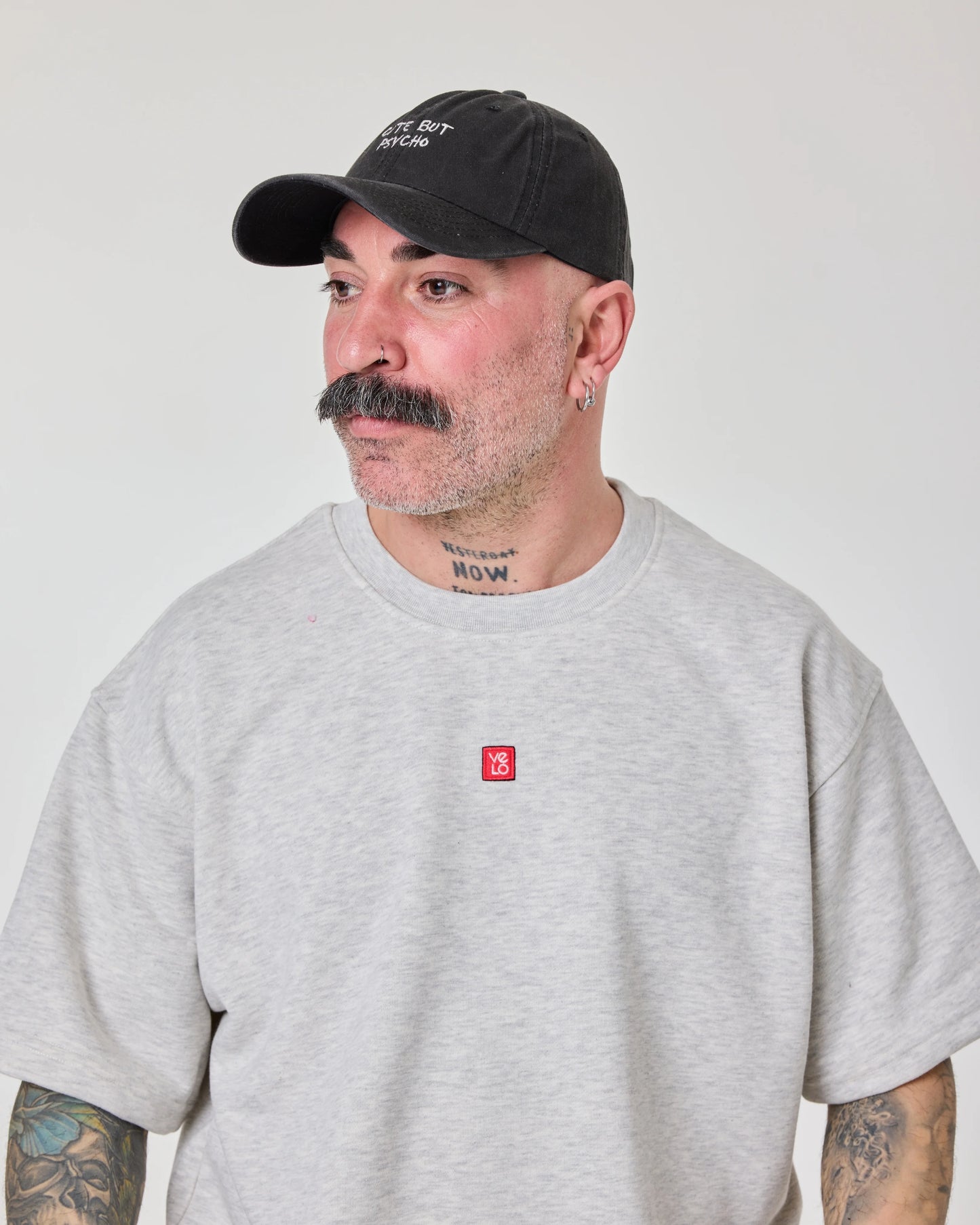 man wearing Cute But Psycho Black Washed Cap Hat