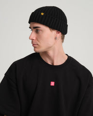 side view of a man wearing Black Fisherman Beanie