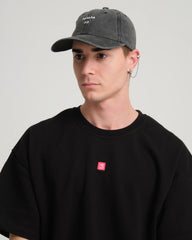 man wearing Hahaha No Black Washed Cap Hat