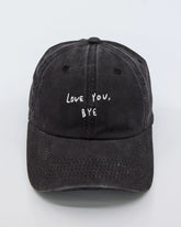 front view of Love You Bye Black Washed Cap