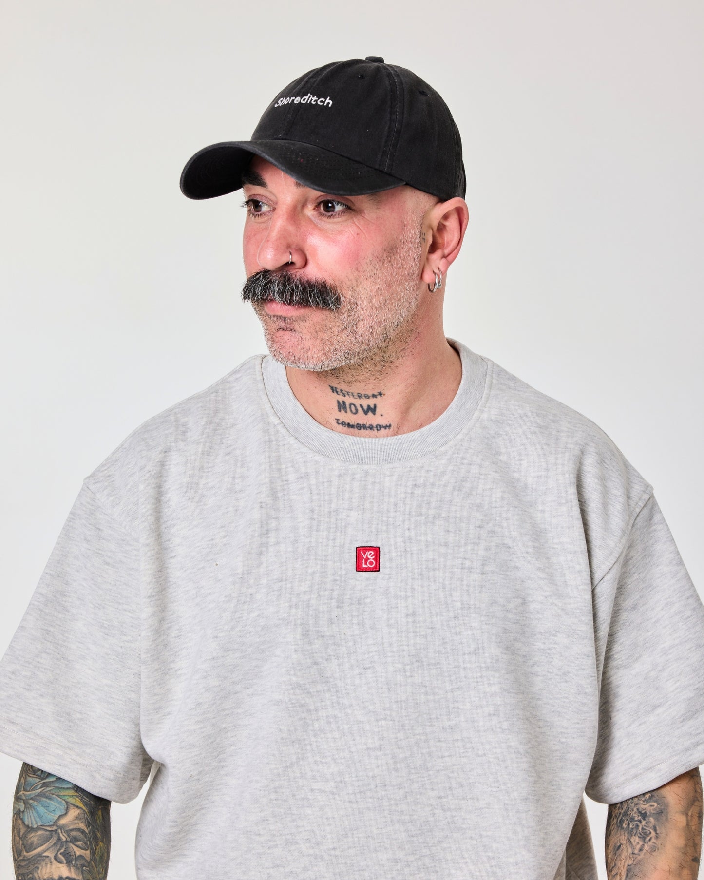 man wearing Shoreditch Black Washed Cap Hat