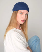 women wearing blue docker hat