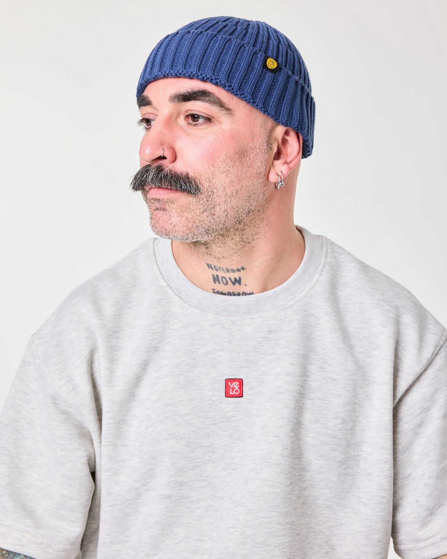 side view of a man wearing Blue Fisherman Beanie
