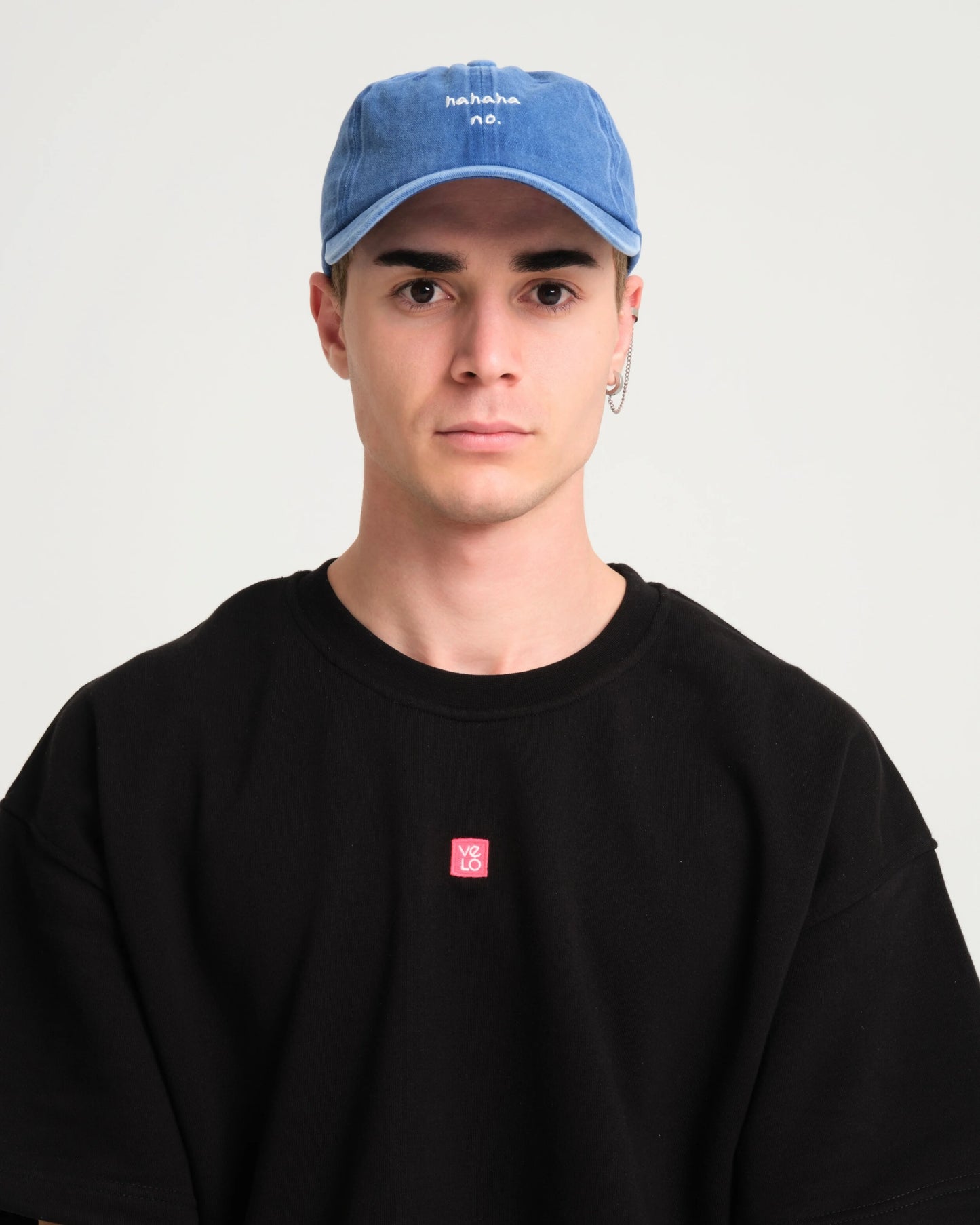 man wearing Hahaha No Blue Washed Cap