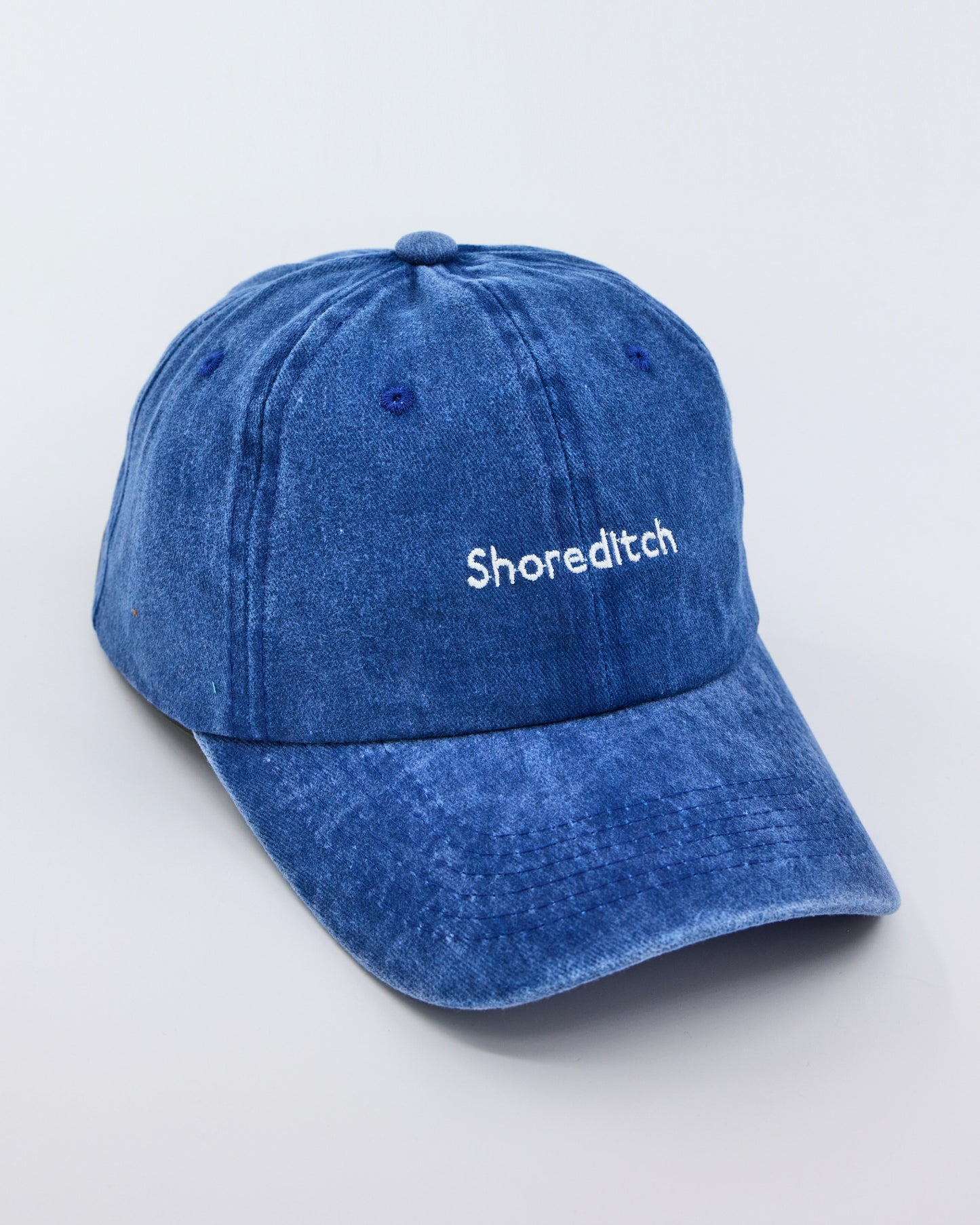 side view of Shoreditch Blue Washed Cap