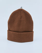 Brown beanie on a light gray background