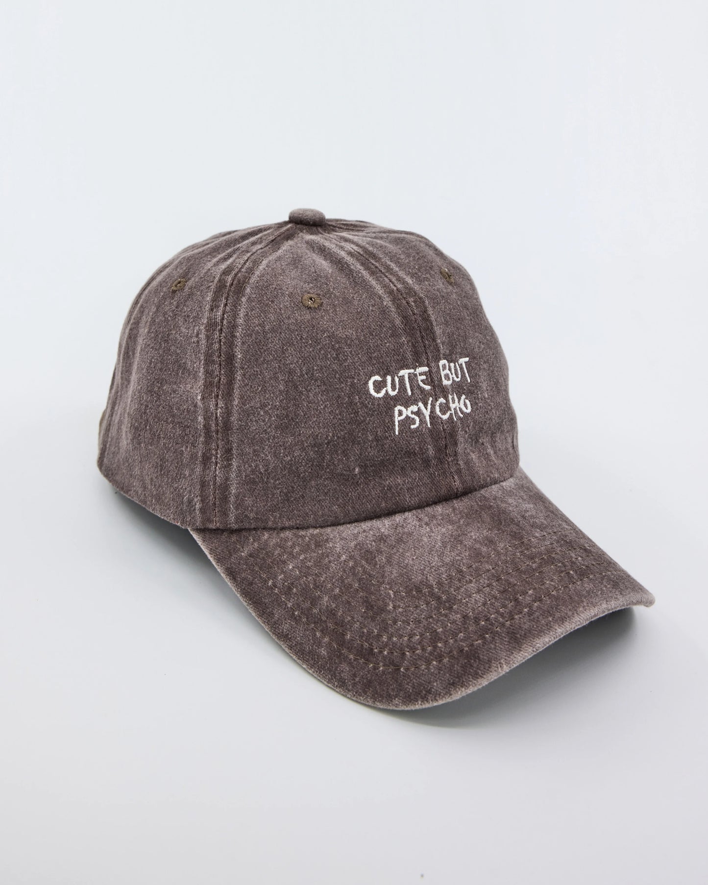 side view of Cute But Psycho Brown Washed Cap