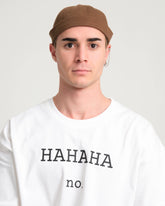 man wearing brown docker hat