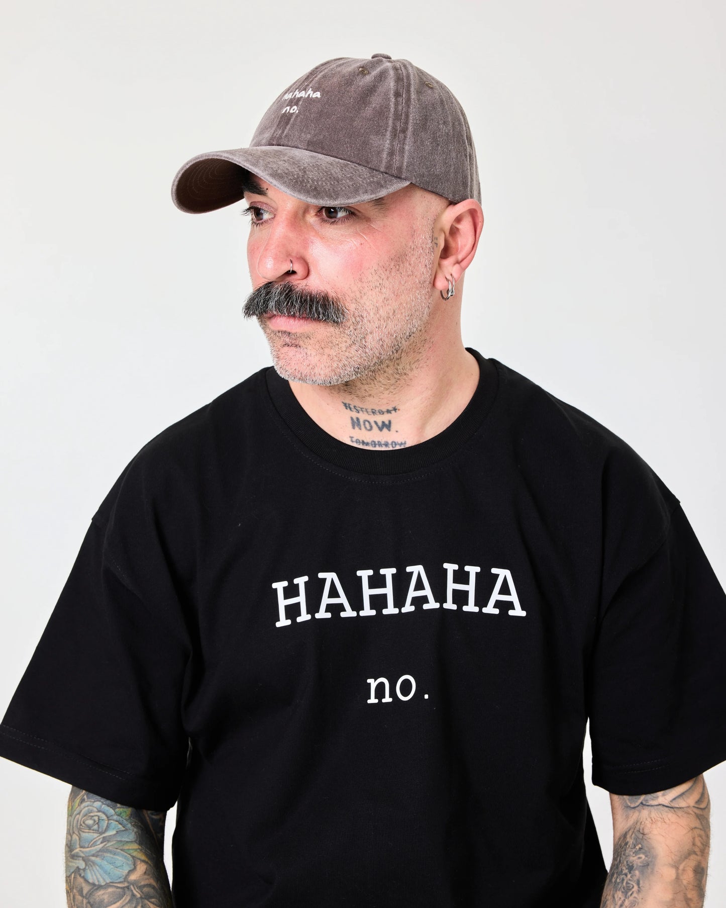 man wearing Hahaha No Brown Washed Cap Hat