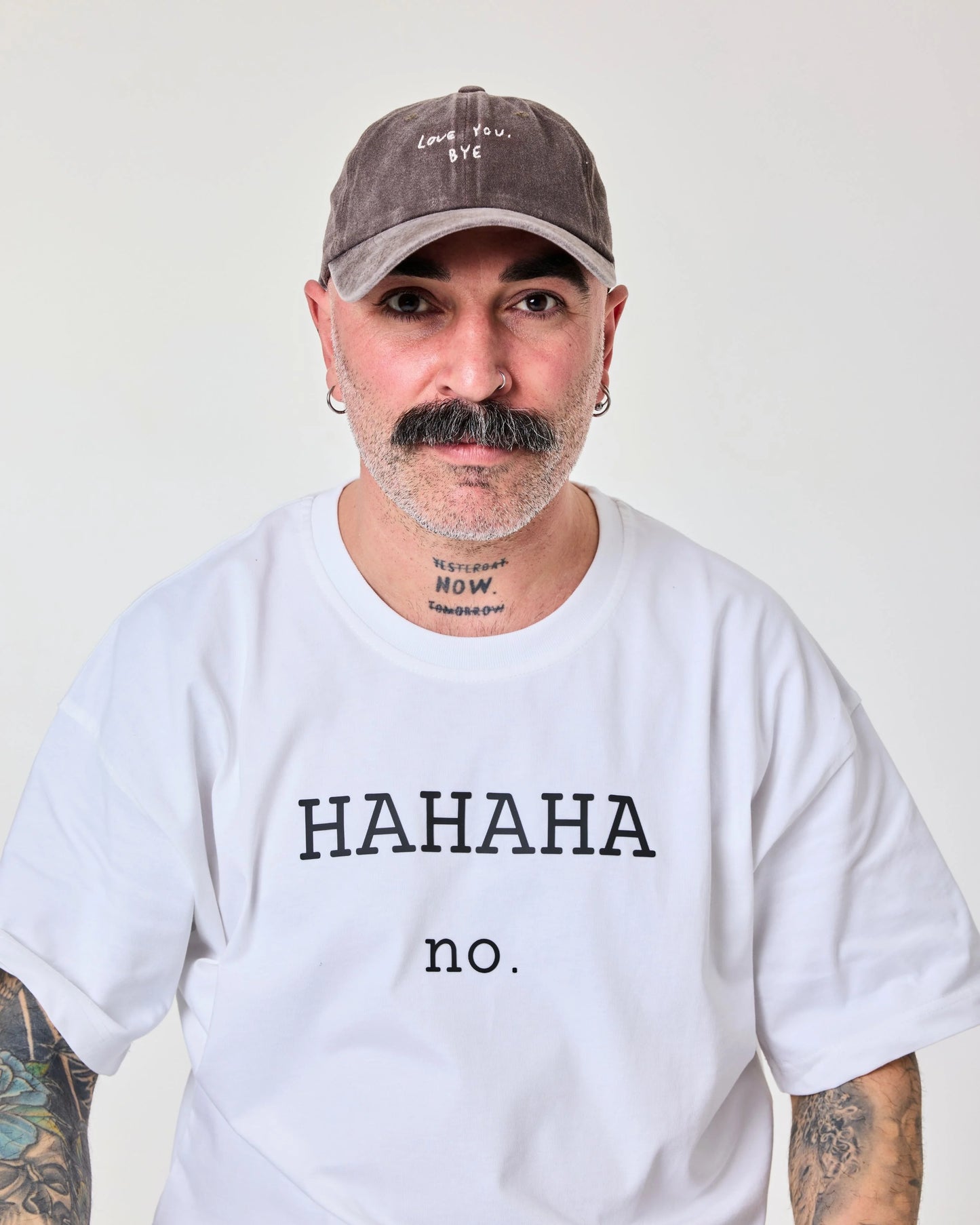 man wearing Love You Bye Brown Washed Cap