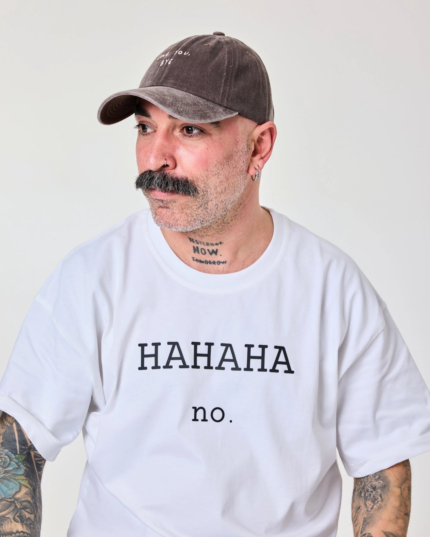 man wearing Love You Bye Brown Washed Cap Hat