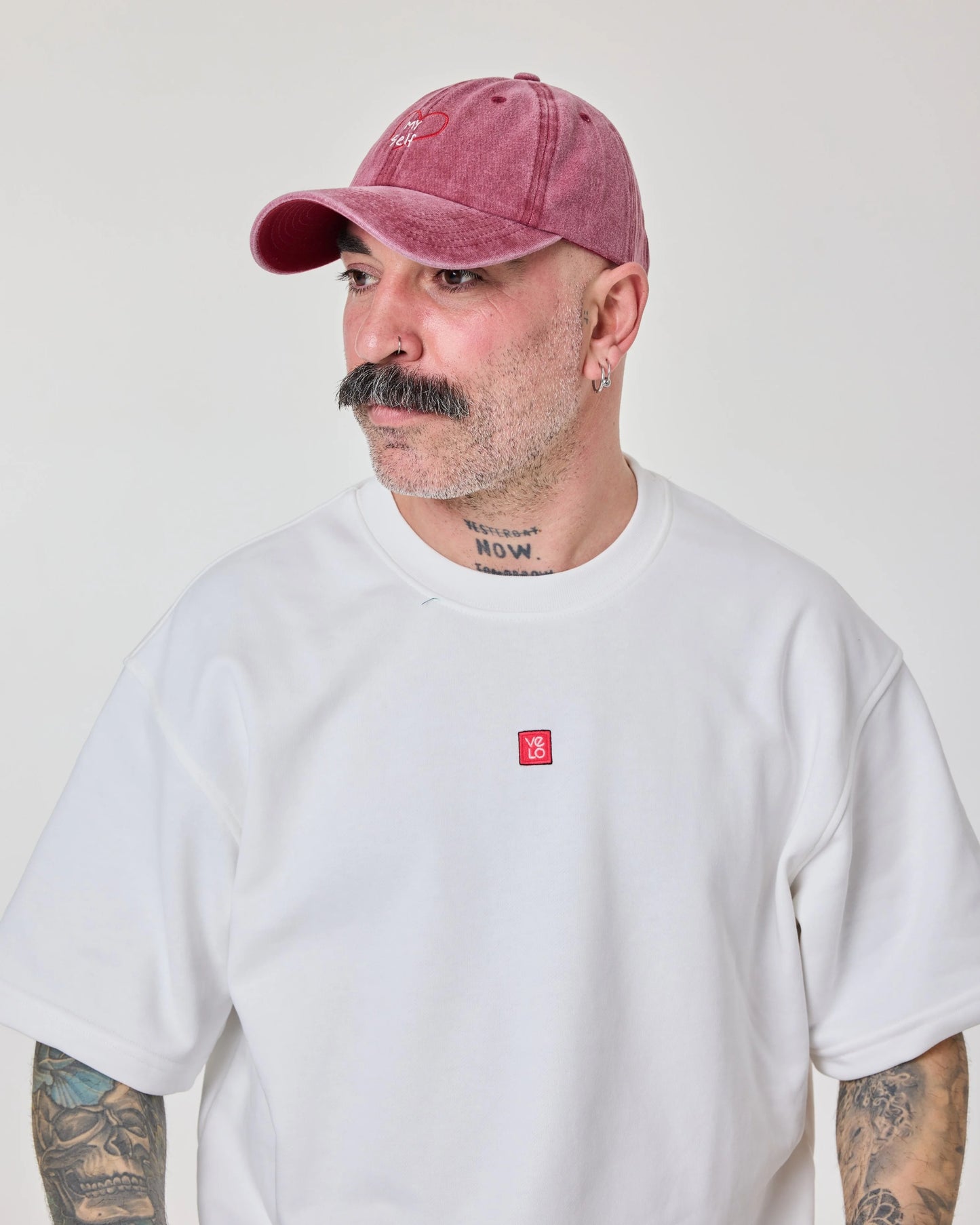 man wearing Love Myself Burgundy Washed Cap Hat