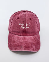 front view of Cute But Psycho Burgundy Washed Caps