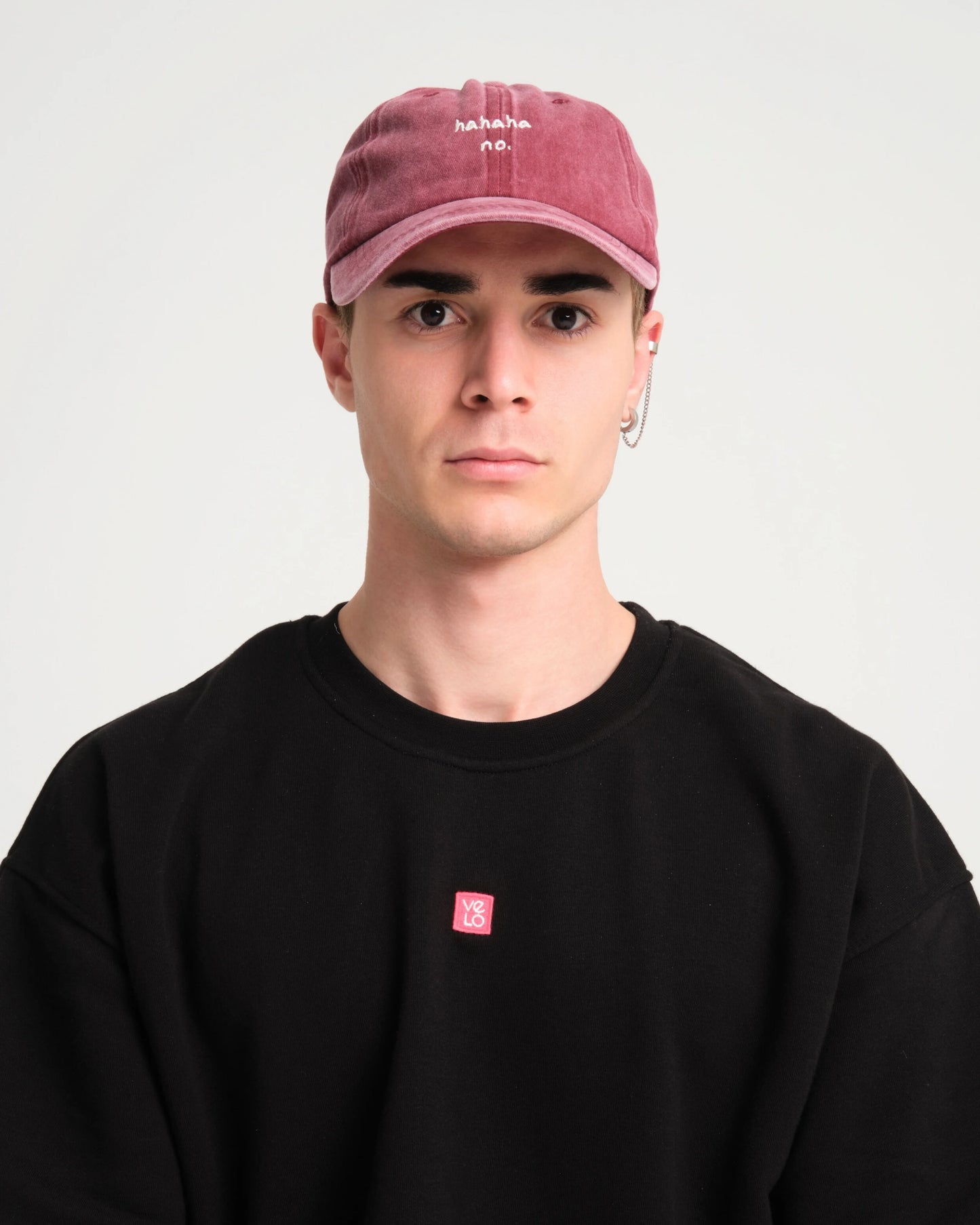 man wearing Hahaha No Burgundy Washed Cap