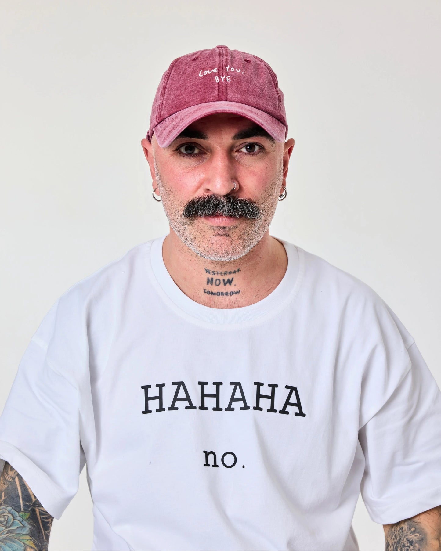 man wearing Love You Bye Burgundy Washed Cap