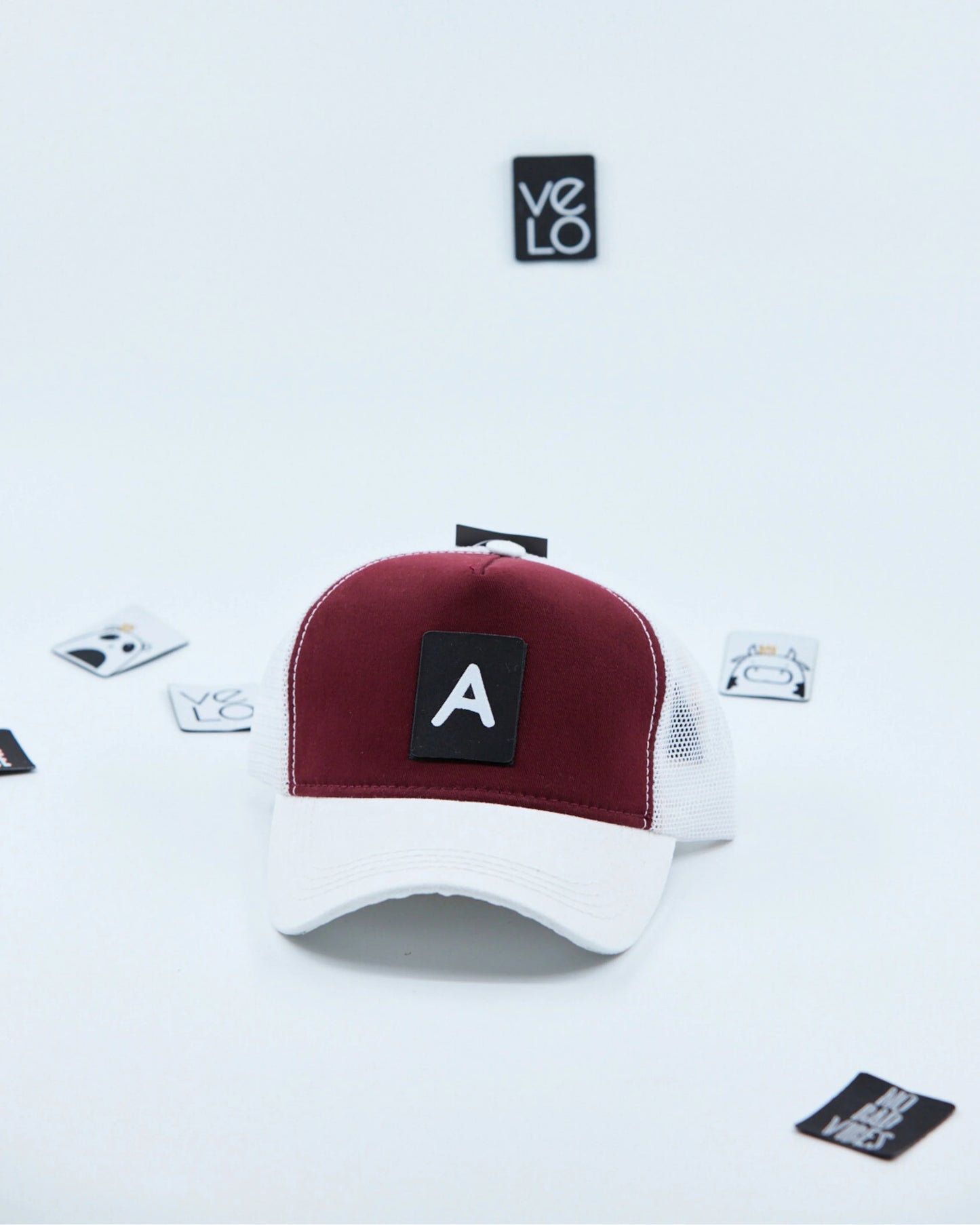 Front view of Burgundy and White Customisable Trucker Cap