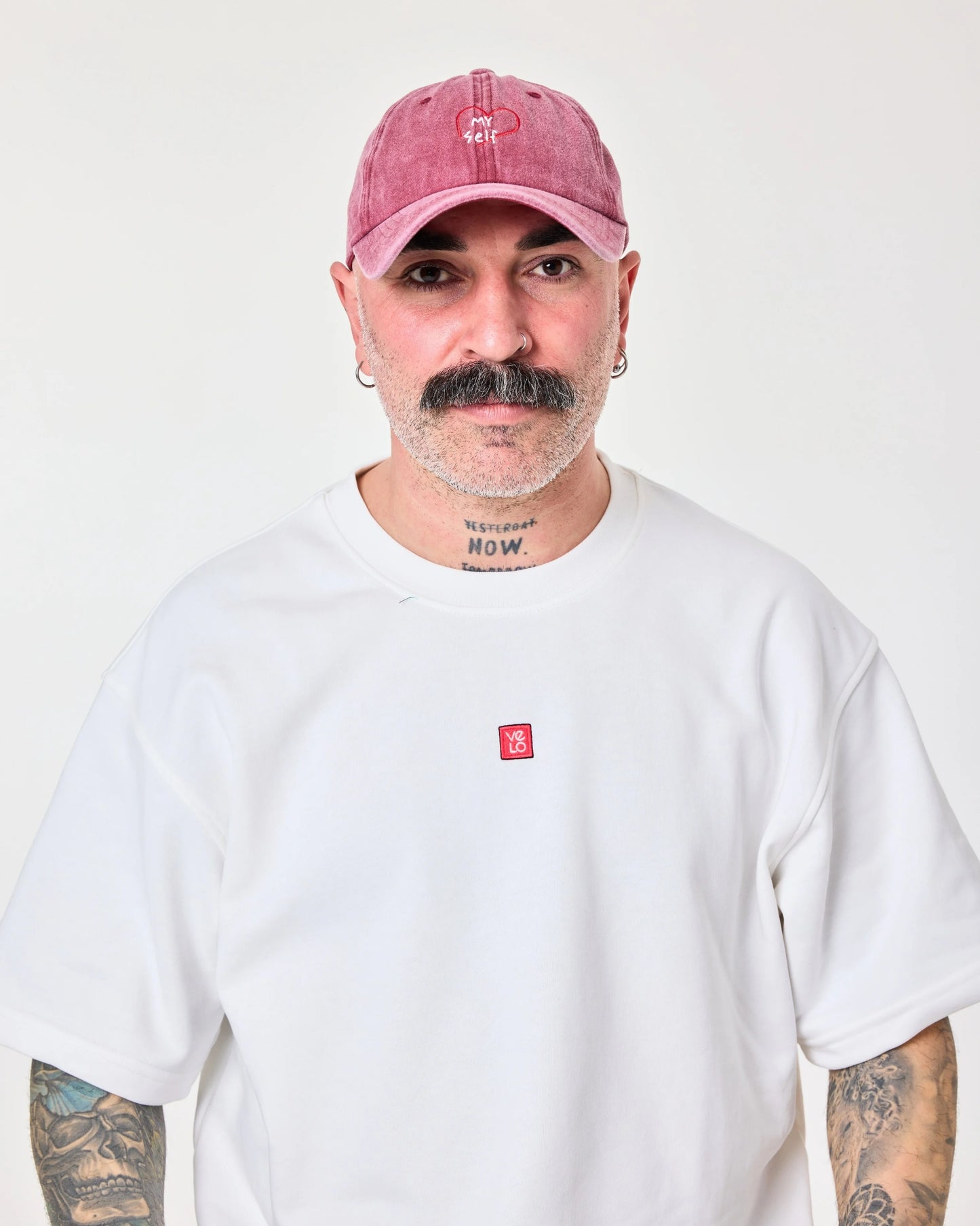 man wearing Love Myself Burgundy Washed Cap