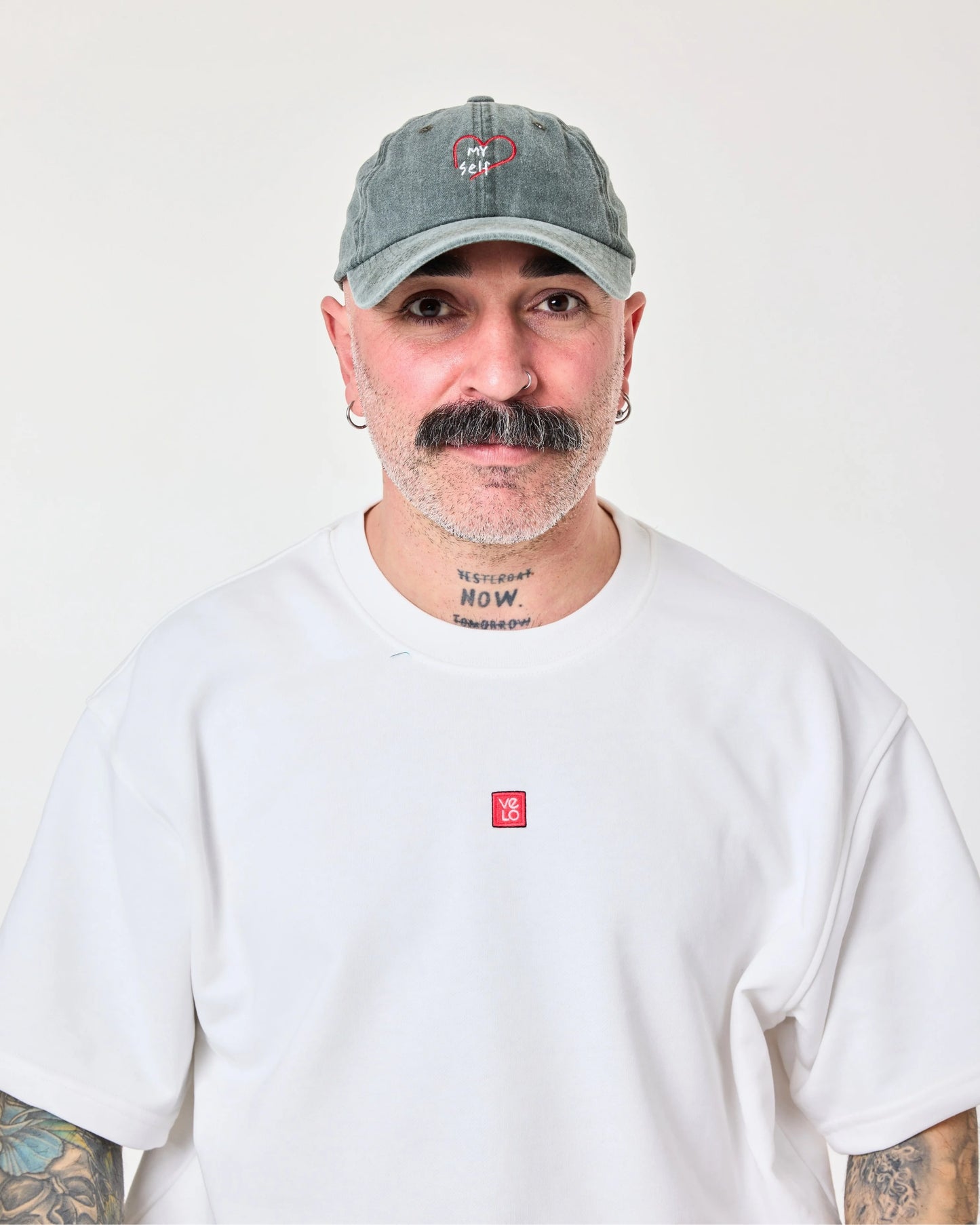 front view of man wearing Love Myself Dark Green Washed Cap