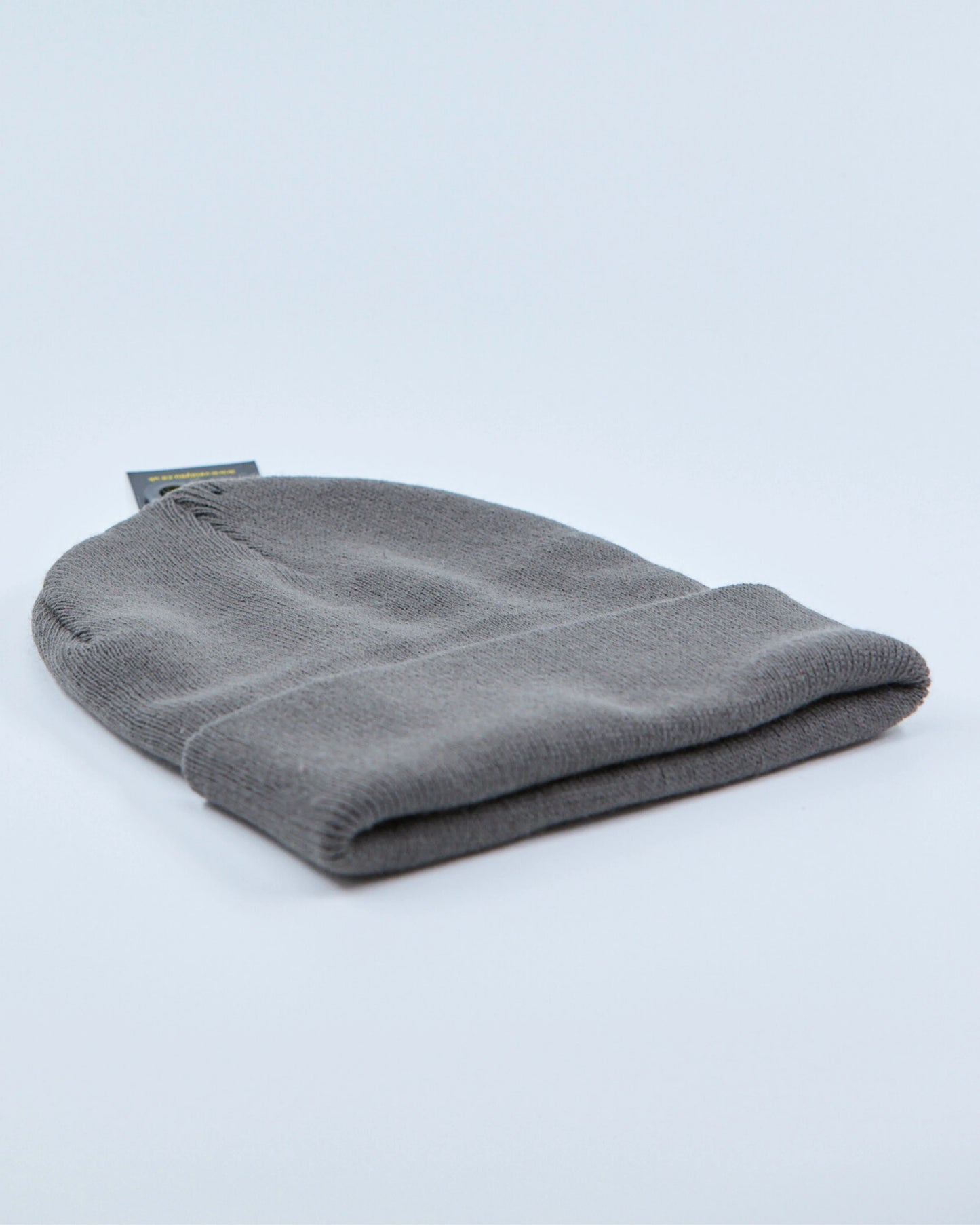 Gray beanie on a light gray background