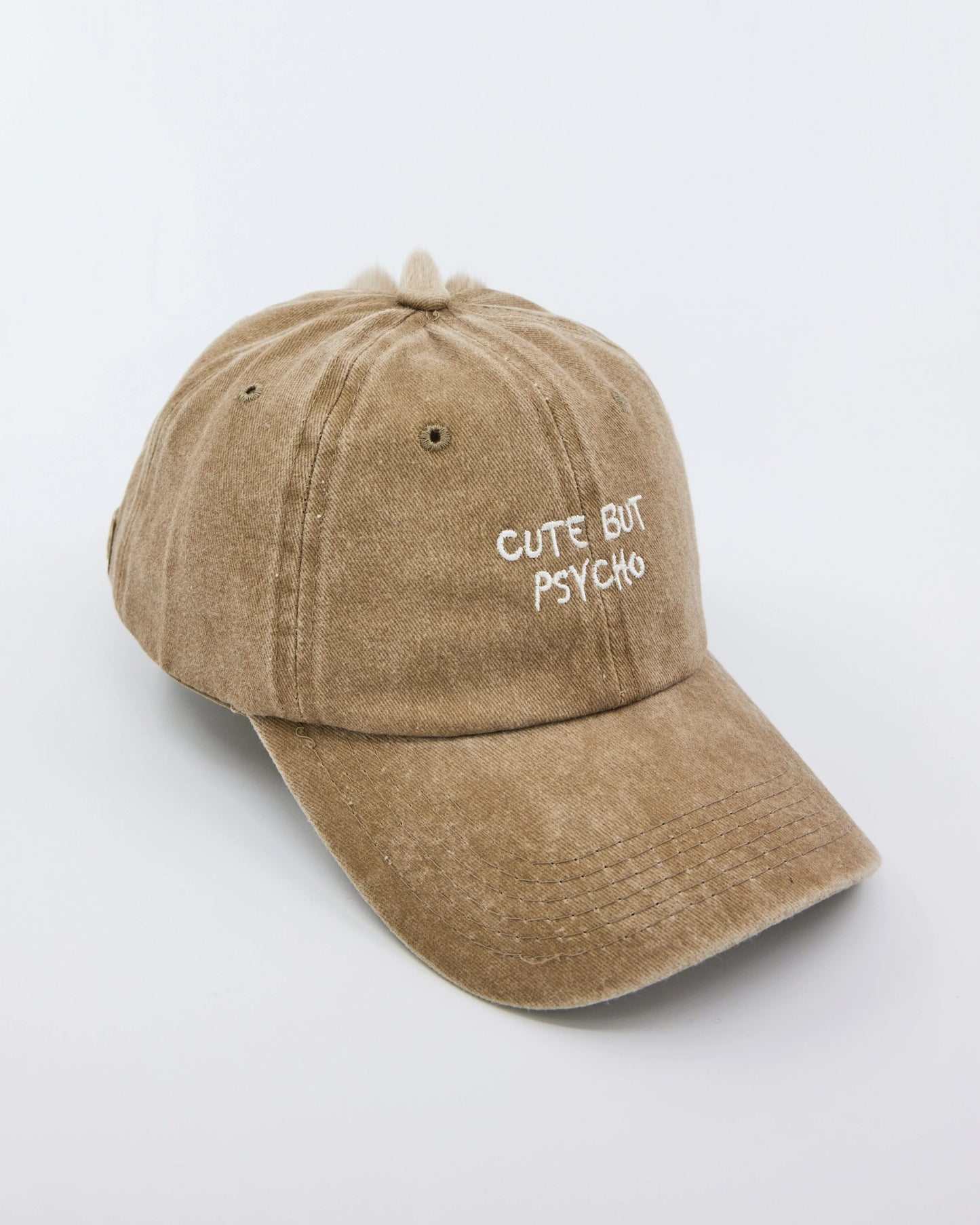 side view of Cute But Psycho Cream Washed Cap