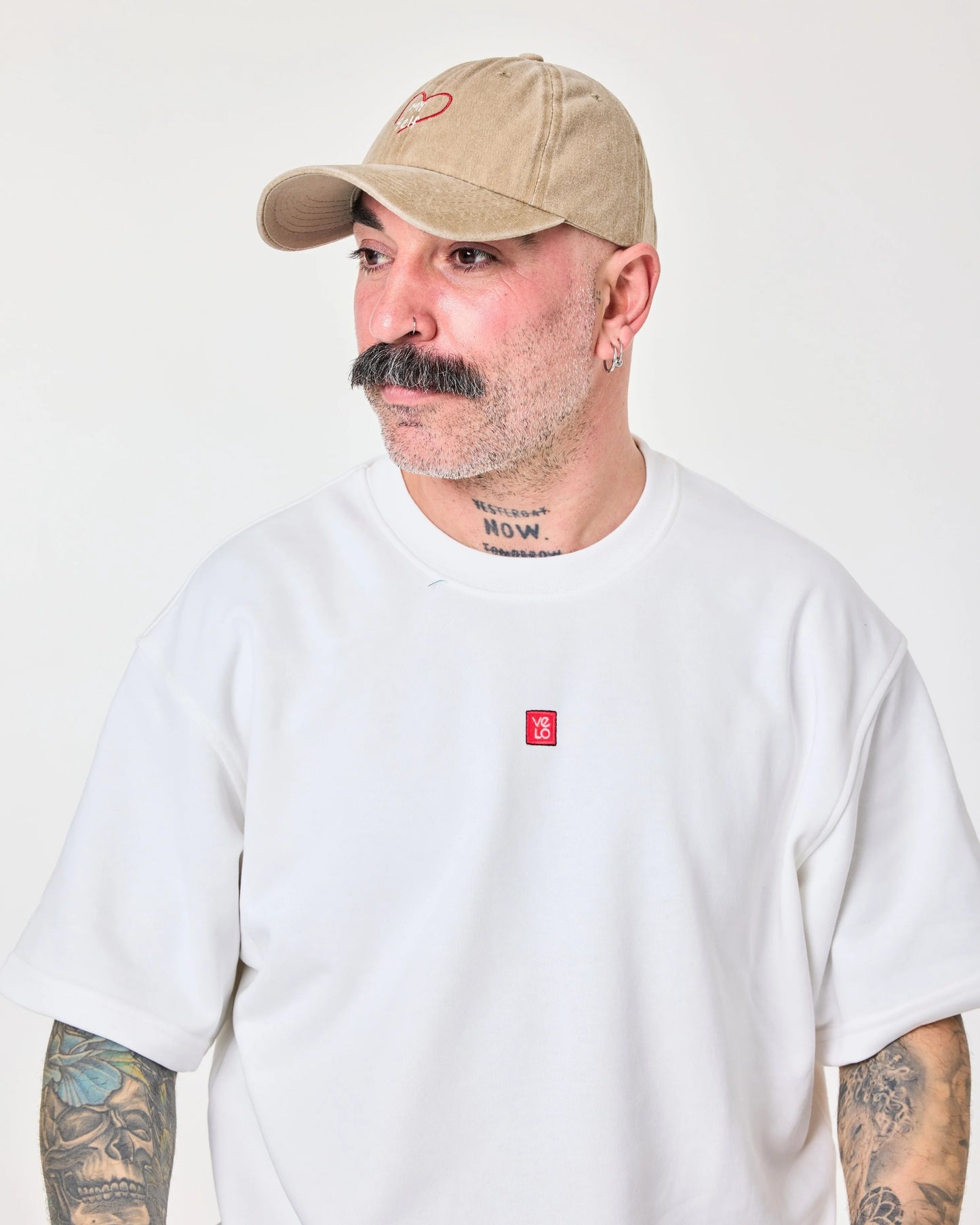 man wearing Love Myself Cream Washed Cap Hat