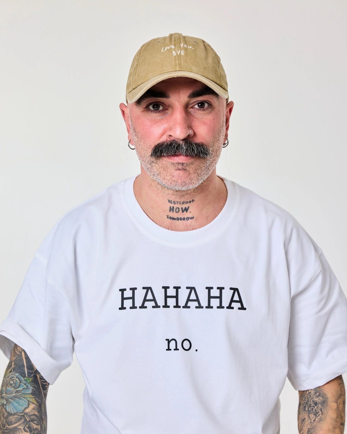 man wearing Love You Bye Cream Washed Cap