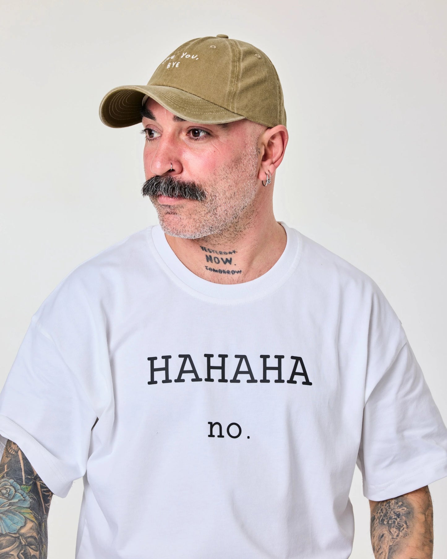 man wearing Love You Bye Cream Washed Cap Hat