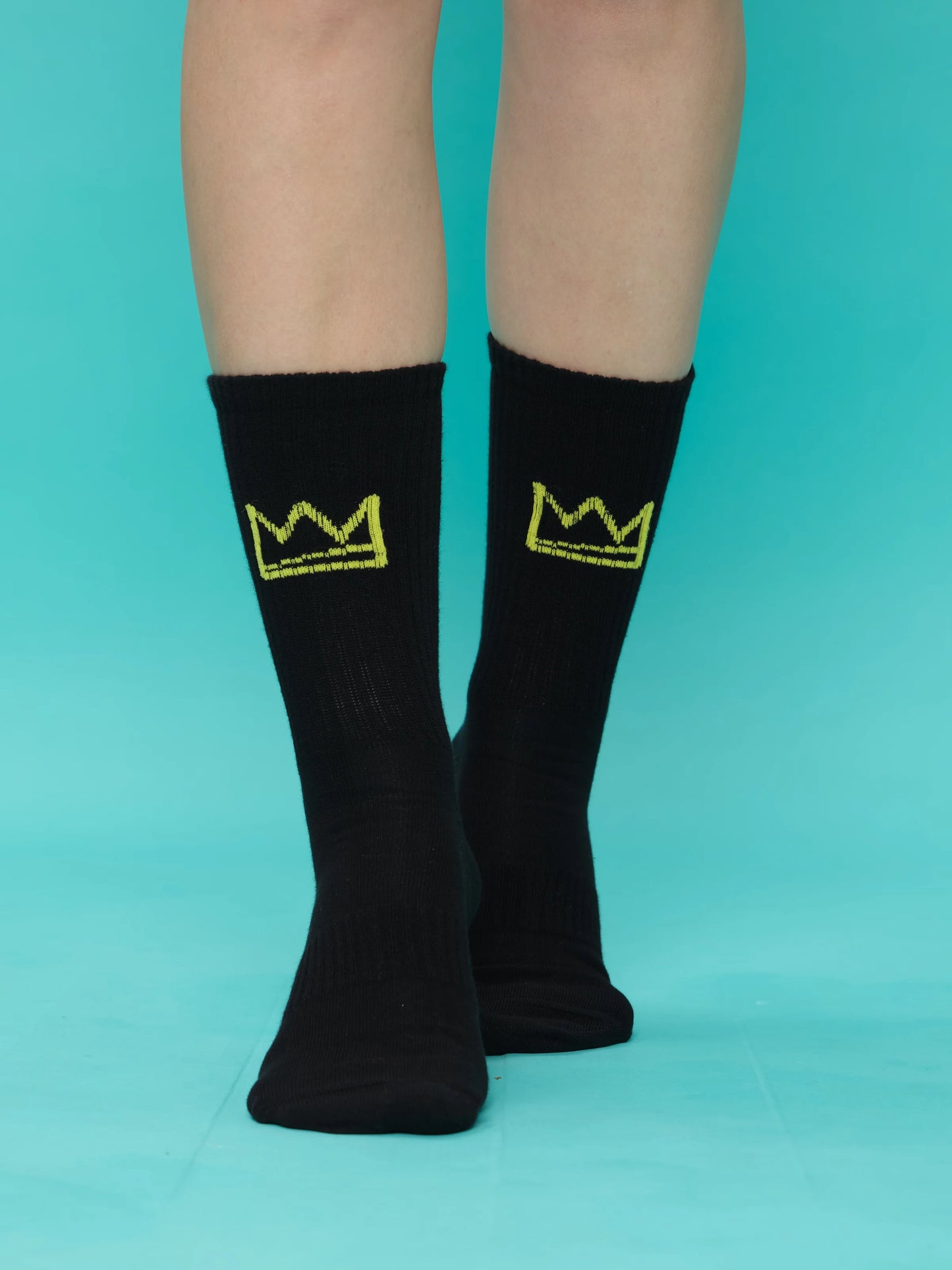 front view of crown black socks