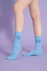 side view of blue cute but psycho socks