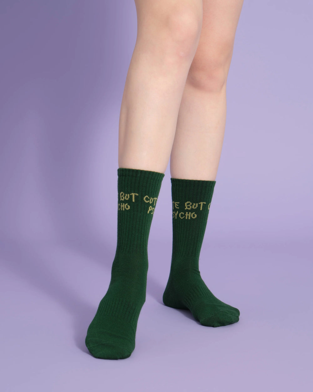 front view of green cute but psycho socks