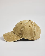 Cute But Psycho Yellow Washed Cap on a light gray background