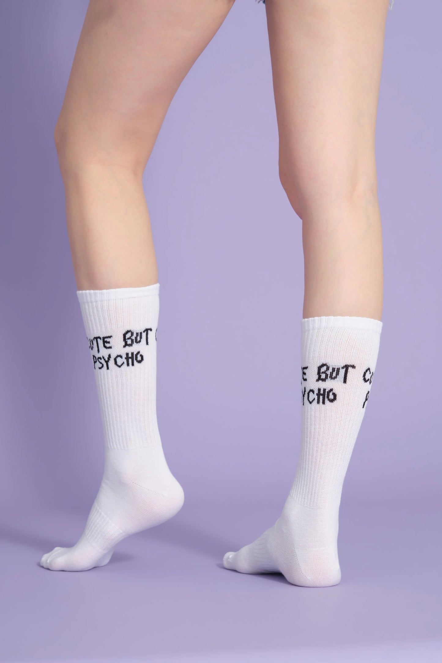 back view of white cute but psycho socks