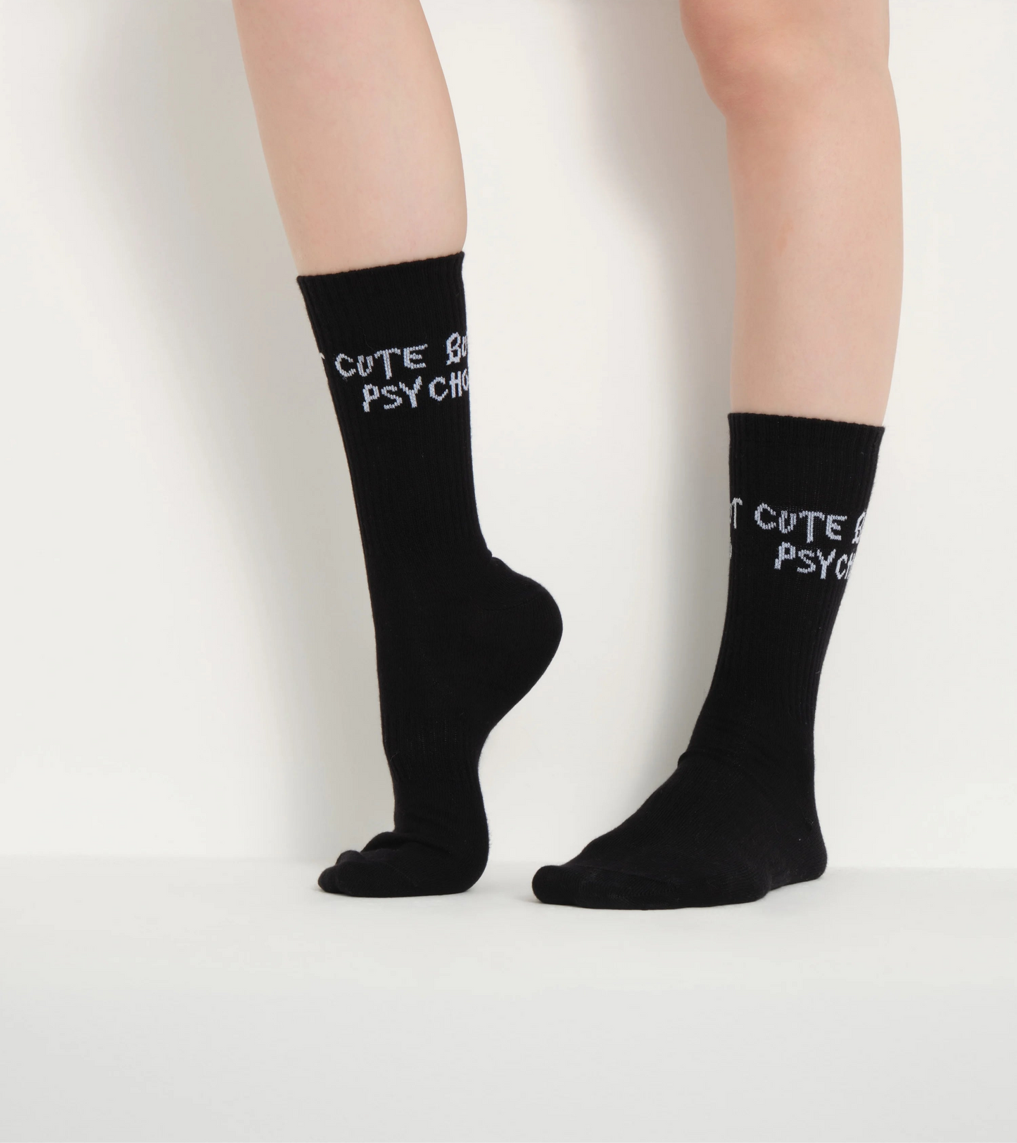 side view of black cute but psycho socks