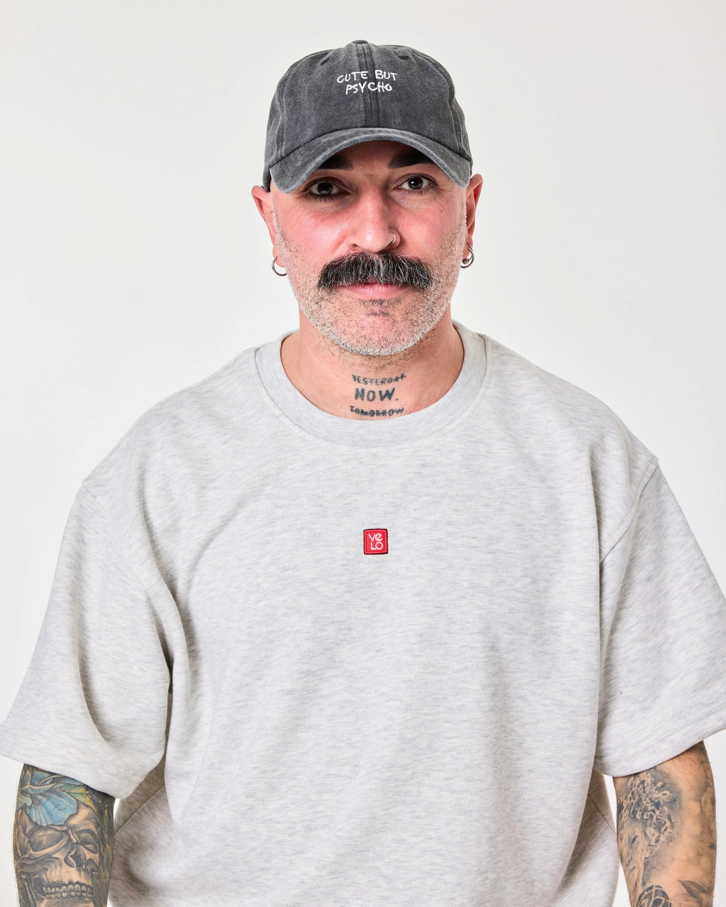 man wearing Cute But Psycho Dark Gray Washed Cap