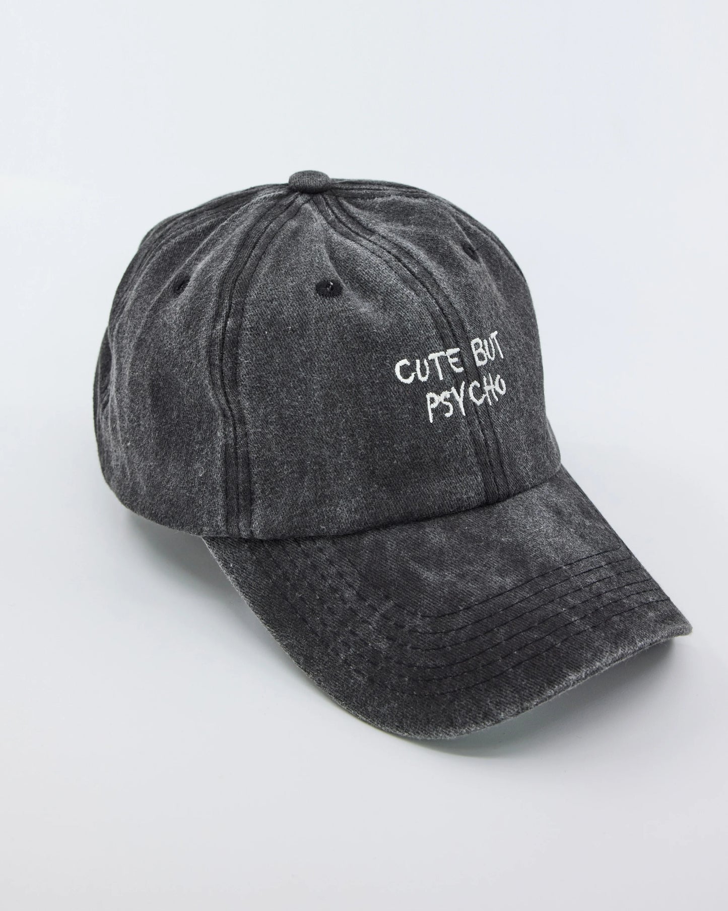 side view of Cute But Psycho Dark Gray Washed Cap