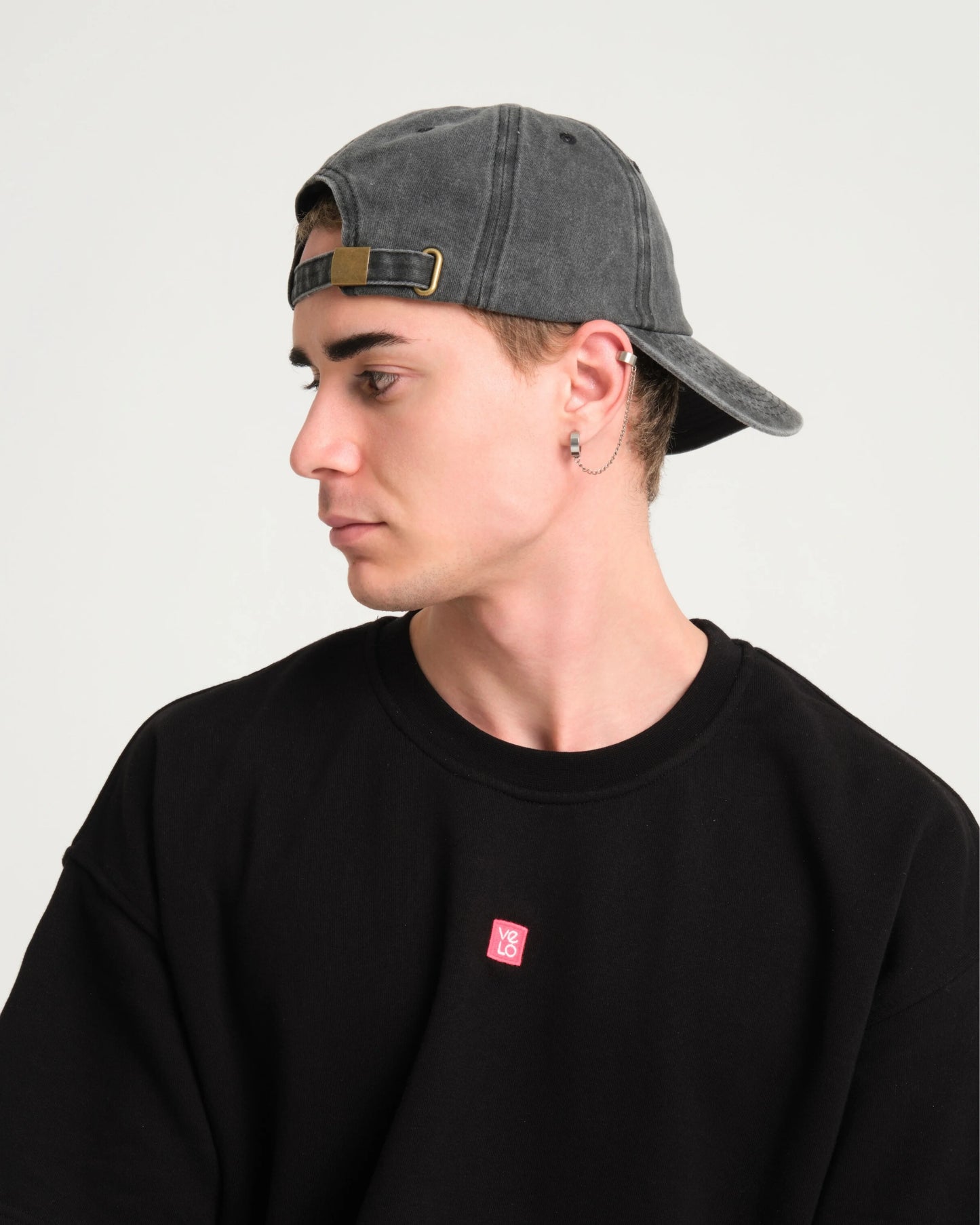 man wearing Cute But Psycho Dark Gray Washed Cap Hat