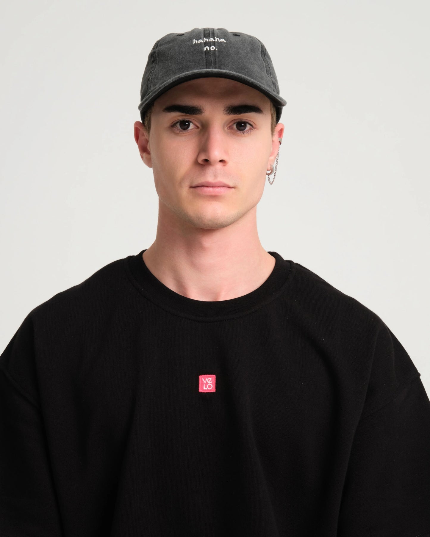man wearing Hahaha No Dark Gray Washed Cap