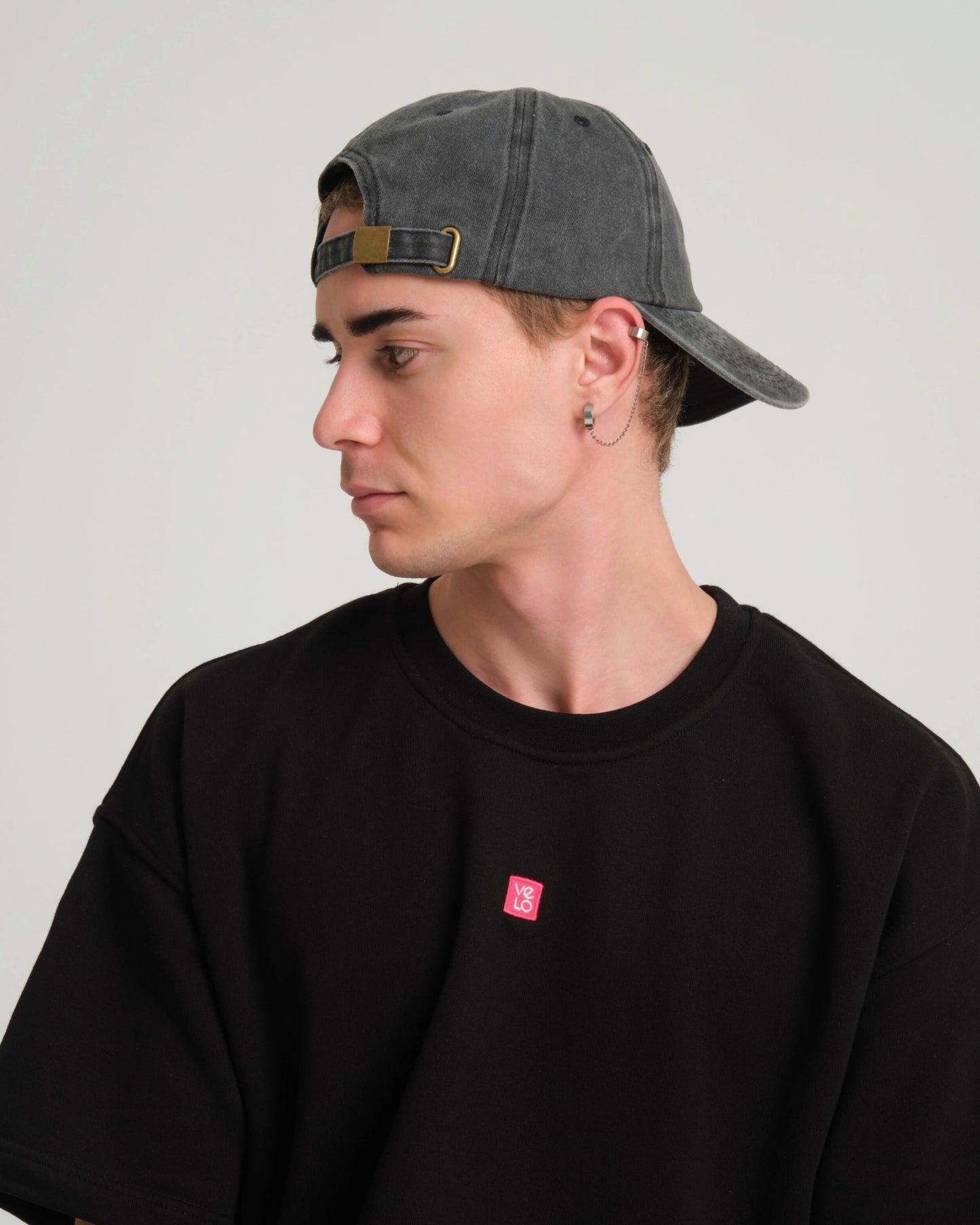 man wearing Hahaha No Dark Gray Washed Cap backwards