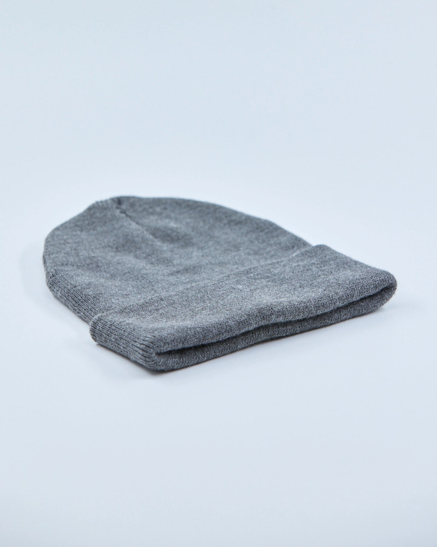 Gray beanie on a light gray background
