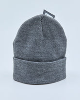 Gray knit beanie on a light gray background